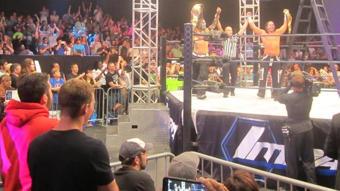 Fans celebrate the Hardy Boys (Jeff and Matt) winning TNA tag team gold at the Impact Zone at Universal Studios Orlando. TNA Impact Wrestling will make its Pop debut live at 9 p.m. ET/PT on Tuesday, Jan. 5. Pop is formerly TV Guide Channel. Your referee is Brian Stiffler.