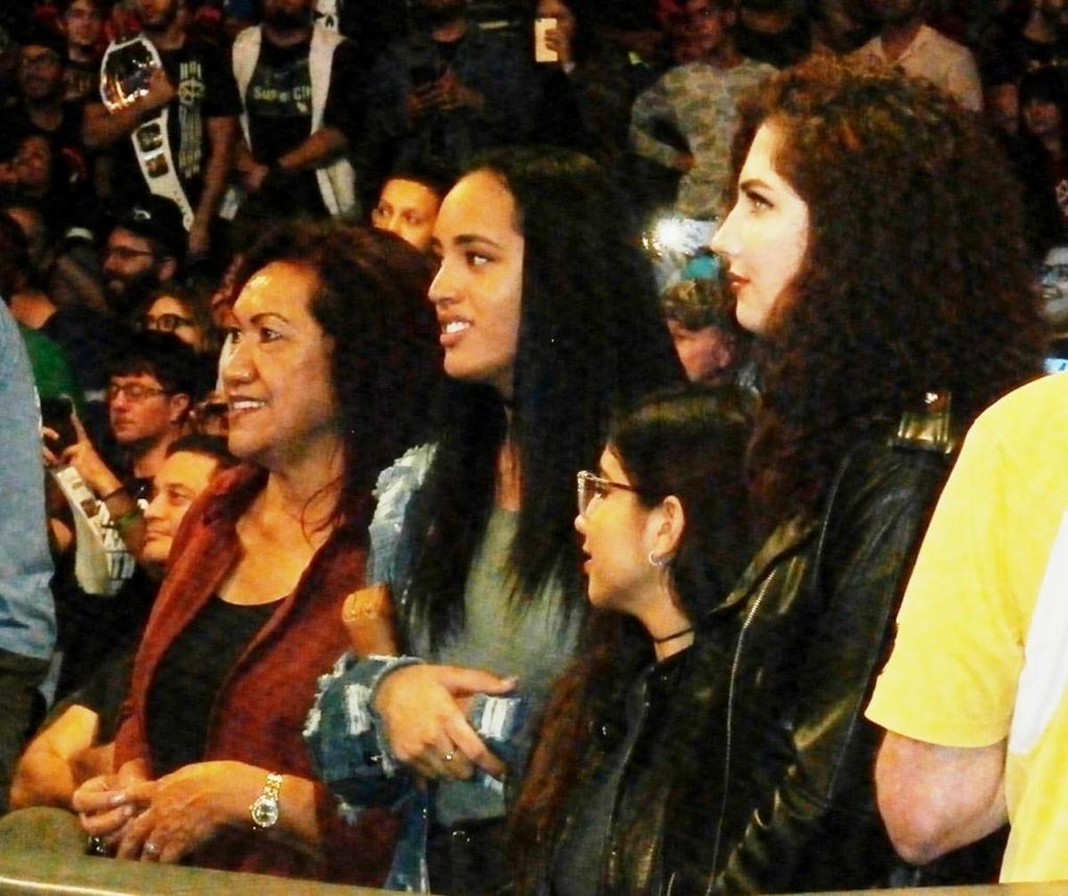 Ata Maivia Johnson with her grand-daughter Simone (second from left) and her friends during a recent WWE Monday Night Raw show at the AmericanAirlines Arena in Miami.