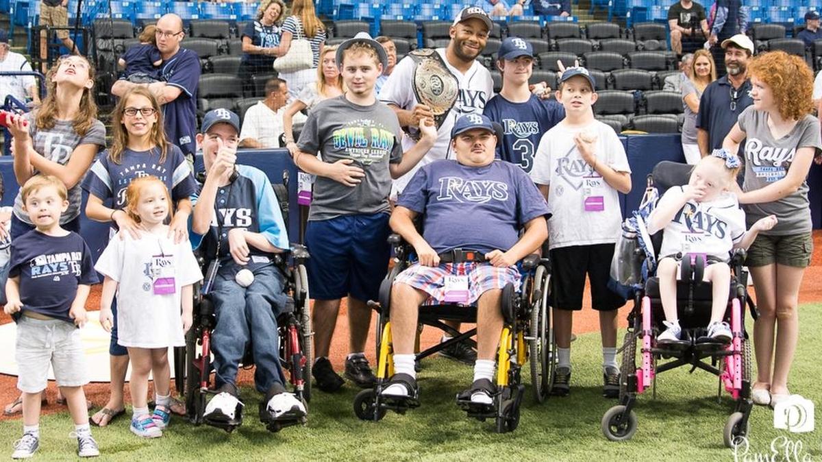 Ring of Honor champ Jay Lethal makes some new friends before a Tampa Bay Rays baseball game at Tropicana Field in St. Petersburg. Lethal lives in Tampa.