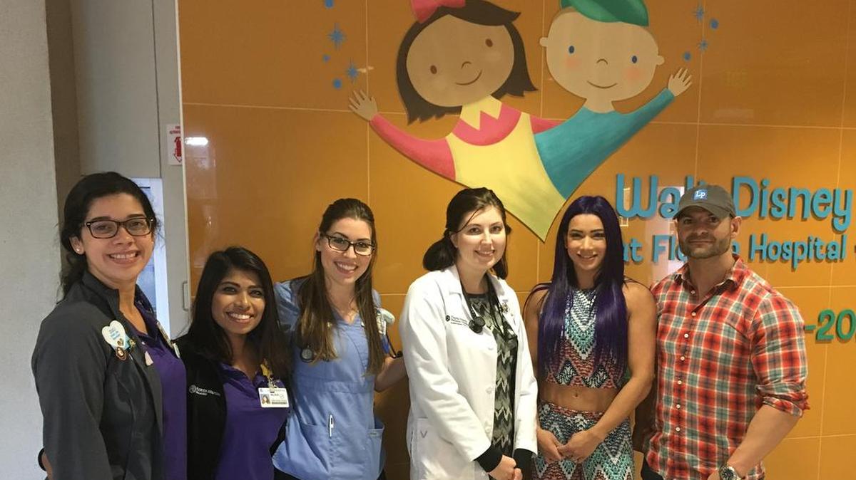 TNA Knockout Raquel (second from right) and CONQUER Pro Wrestling’s Jason Static (Jason Calabrese) with doctors, nurses and staff of the Florida Hospital for Children in Orlando.