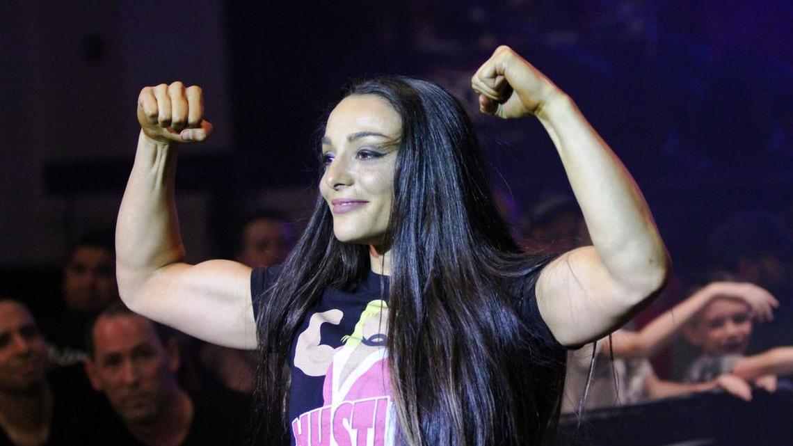 WWE Mae Young Classic alternate Deonna Purrazzo, 23, is one of the leaders of the resurgence of women’s wrestling in Ring of Honor with Women of Honor. A Jersey girl, this tough 5-2 athlete is ready to battle all shapes, sizes and skill levels. Sporting her Rip Rogers Hustler T-shirt, she is passionate about wrestling and elevating women’s wrestling.