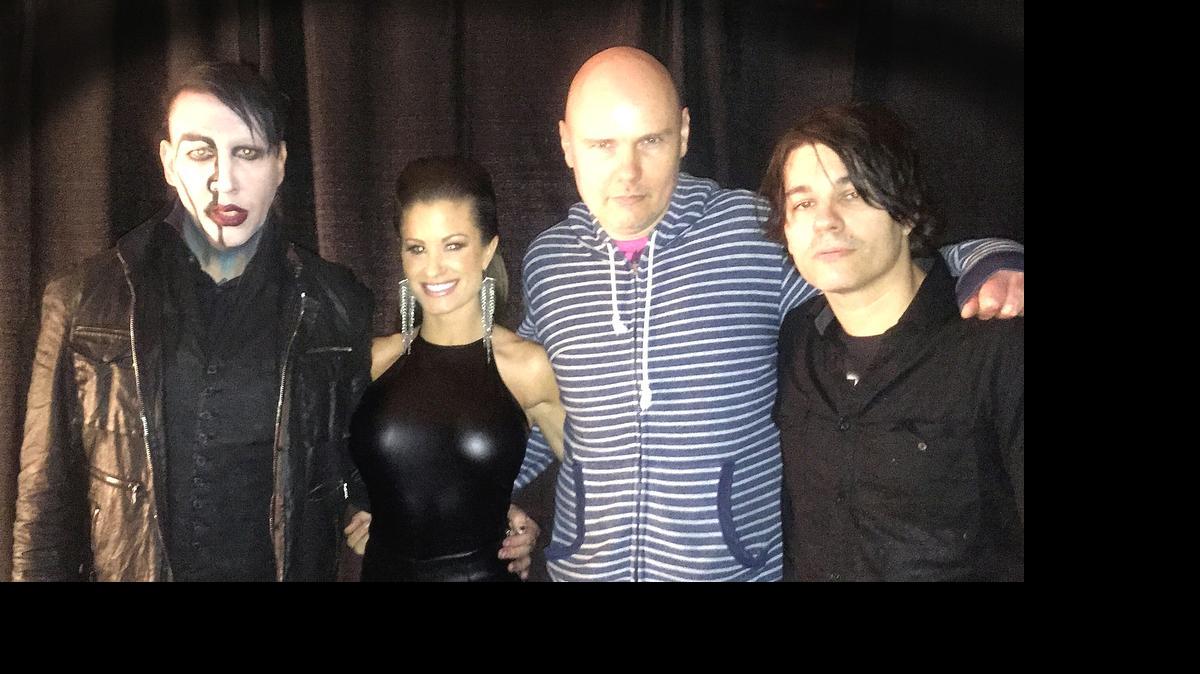 
The beautiful and talented Brooke, TNA Impact Wrestling’s new Knockouts champ, backstage with South Florida’s own Marilyn Manson (left) and Smashing Pumpkins’ frontman Billy Corgan (second from right) for The End Times Tour on Thursday, July 16 at the NRG Arena in Houston.
