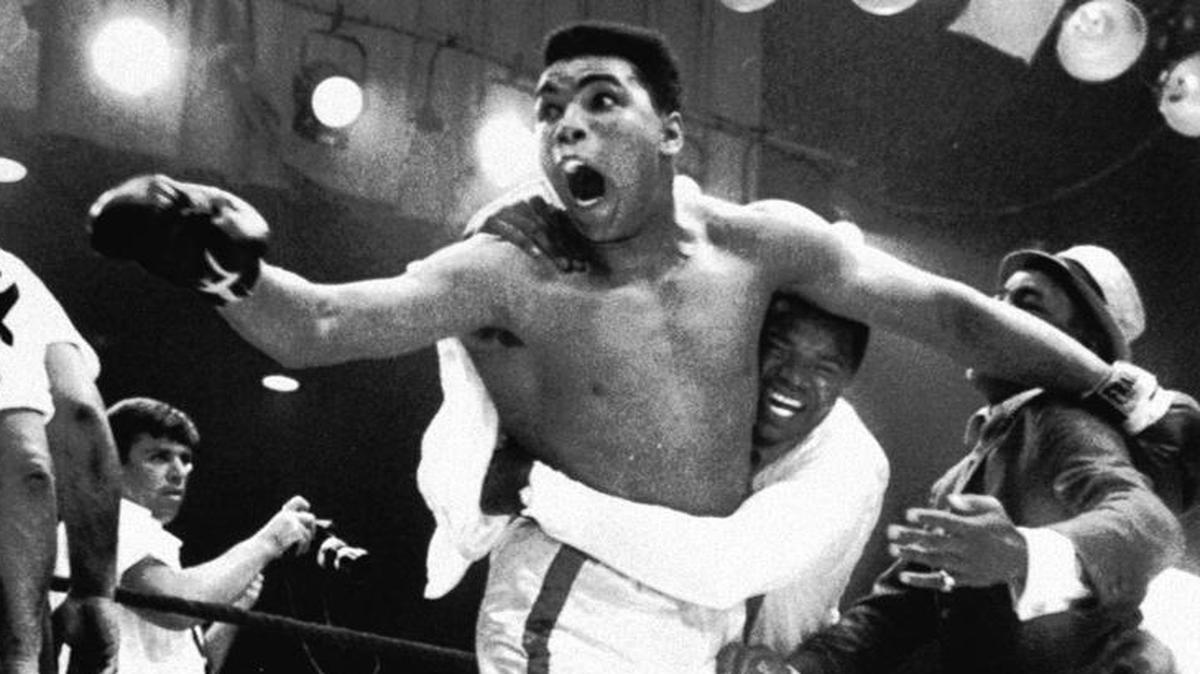 Muhammad Ali is jubilent after knocking out Sonny Liston in their world heavyweight championship bout at the Miami Beach Convention Hall in 1964. The then Cassius Clay won the heavyweight championship of the world on Feb. 25, 1964, after the champ Sonny Liston failed to answer the bell in the 8th round. In many way, this event changed boxing history as Clay became Muhammad Ali after joining the Black Muslims. Ali has become a world figure to this day.