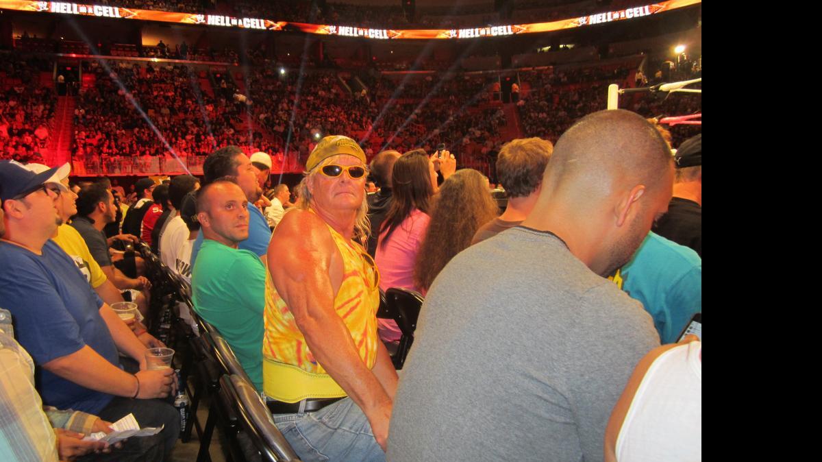 
South Florida’s own Tye Dye Guy was named by WWE.com as one of the 10 greatest fans in sports-entertainment history. Here is Tye Dye Guy close to the ring for the WWE Hell in a Cell pay-per-view at the AmericanAirlines Arena in Miami.
