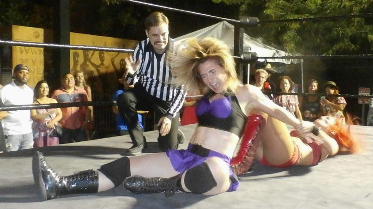 Lucha Underground star Ivelisse is one of the top women's wrestlers going today. Here she has the upperhand on international talent Sexy Star in the main event of a Coastal Championship Wrestling indie show outside Coyo Taco in Wynwood in Miami-Dade County. Your referee James St. Smash.