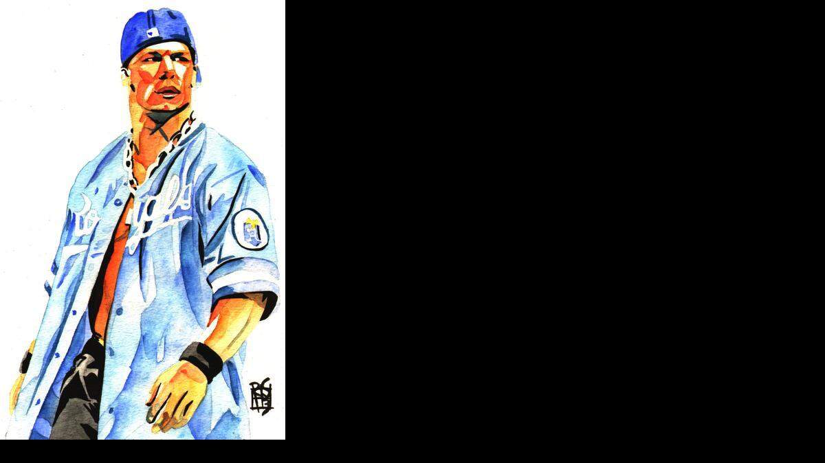 
Kansas City native Rob Schamberger, a talented artist, painted WWE superstar John Cena in a Kansas City Royals jersey. When Cena was developing his character in WWE, Cena wore ‘throwback’ jerseys to the ring including this one. ‘WWE Monday Night Raw’ is in Kansas City on Oct. 20, the eve of the Kansas City Royals hosting Game 1 of the MLB World Series.

