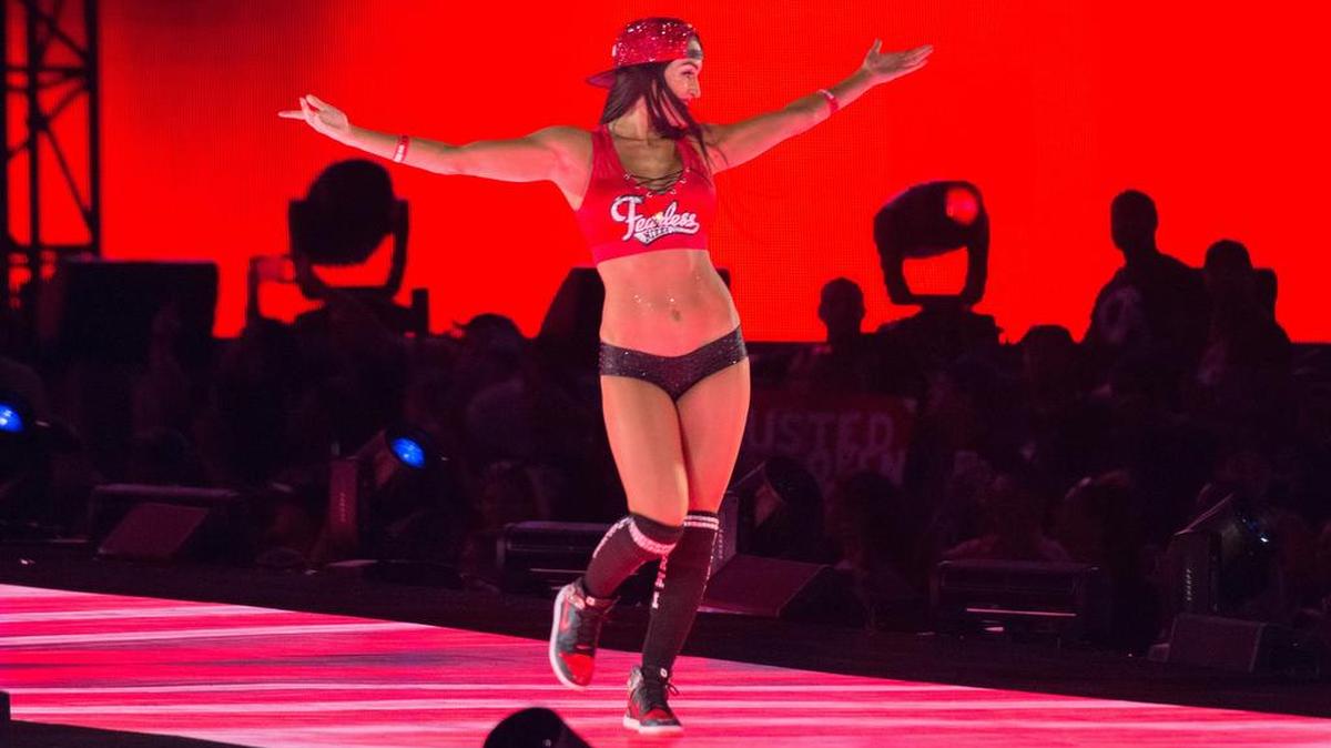 WWE Superstar and Total Divas star Nikki Bella is taking time off again because of a prior neck injury. She told E! News she will not be a full-time wrestler but is hopeful of continuing a limited in-ring schedule. She teamed with John Cena at WrestleMania 33 Orlando, and after the match he proposed, giving her two WrestleMania moments in one.