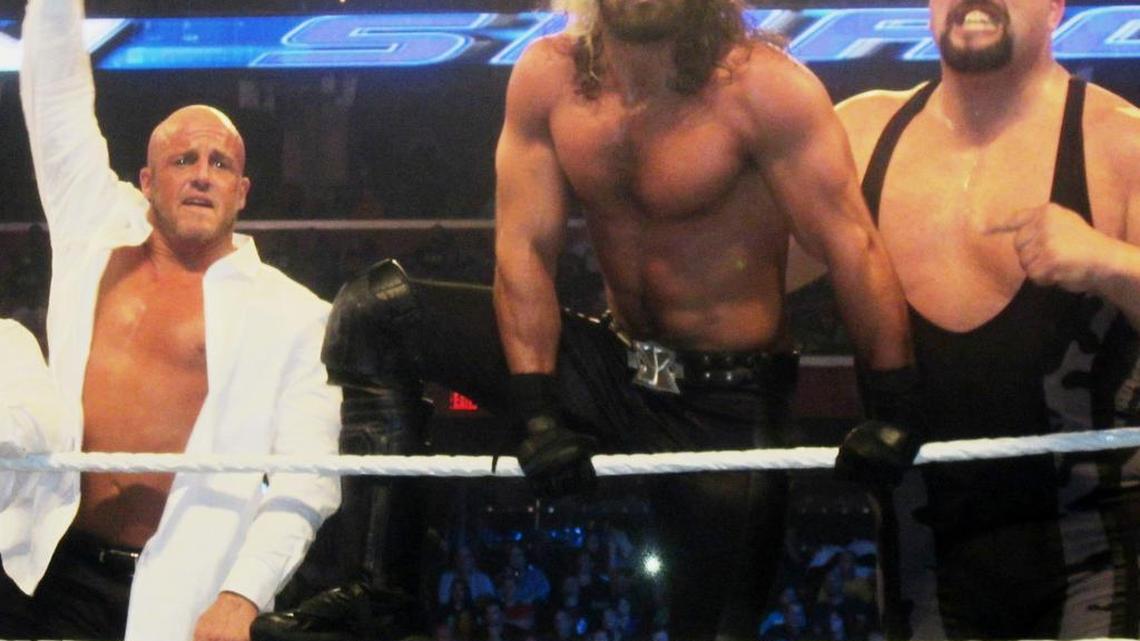 WWE Superstar Big Show (right), who enjoys helping younger talent progress, during a WWE SmackDown taping in South Florida. SmackDown will be at the AmericanAirlines Arena on Tuesday, June 28 in Miami. Also pictured are Joey Matthews (left) and Seth Rollins.