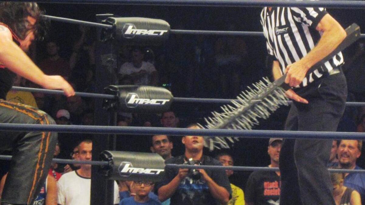 
Legendary referee Earl Hebner is not afraid to confront any wrestler for wrong doing, even the monster Abyss, who tried to use Janice. Hebner will be inducted into the TNA Hall of Fame on Oct. 3 in his home state, Virginia.
