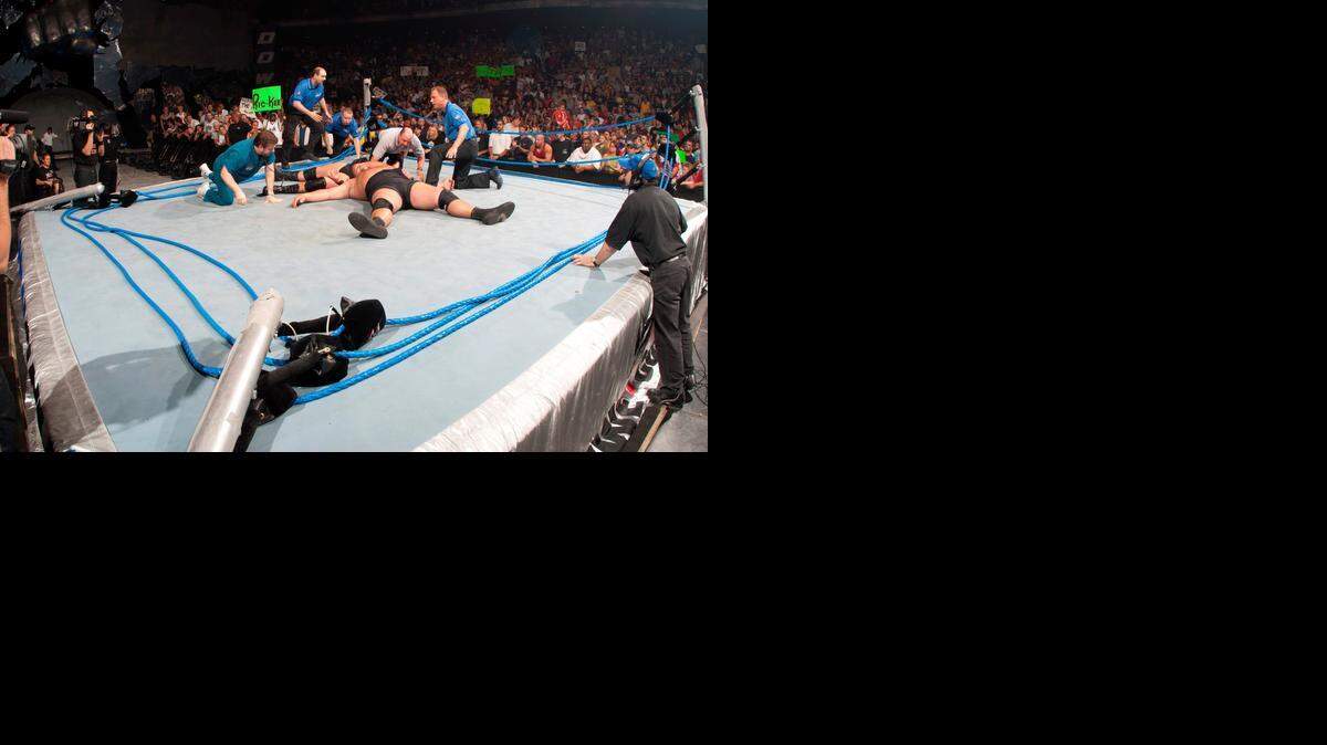 
The force of a suplex off the top rope from Brock Lesnar and Big Show collapsed the ring in Orlando on WWE SmackDown. The weekly prime-time television show will move from Fridays to Thursdays, beginning Jan. 15 on Syfy.
