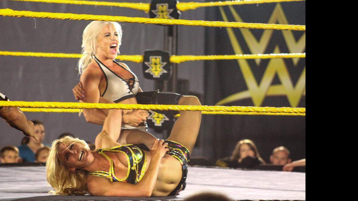 
Dana Brooke (top) and Charlotte are intense during a WWE NXT show at the Havert L. Fenn Center in Fort Pierce. NXT will return to the Havert L. Fenn Center in June.
