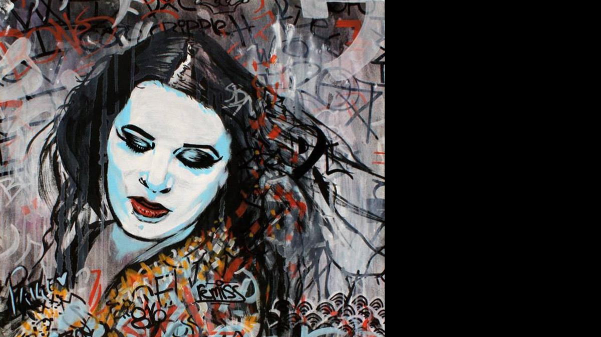 
Artist Rob Schamberger captures WWE Diva Paige on another canvas. Paige will be featured on “Total Divas,” which premieres season four at 9 p.m. ET Tuesday, July 7 on E!.

