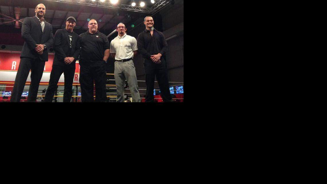 
WWE NXT head coach/trainer Bill DeMott (center) proudly stands with talented wrestlers/sports entertainers Cesaro, Sami Zayn, Adrian Neville and Bo Dallas at the WWE Performance Center in Orlando. DeMott took to Twitter to announce his resignation from WWE.

