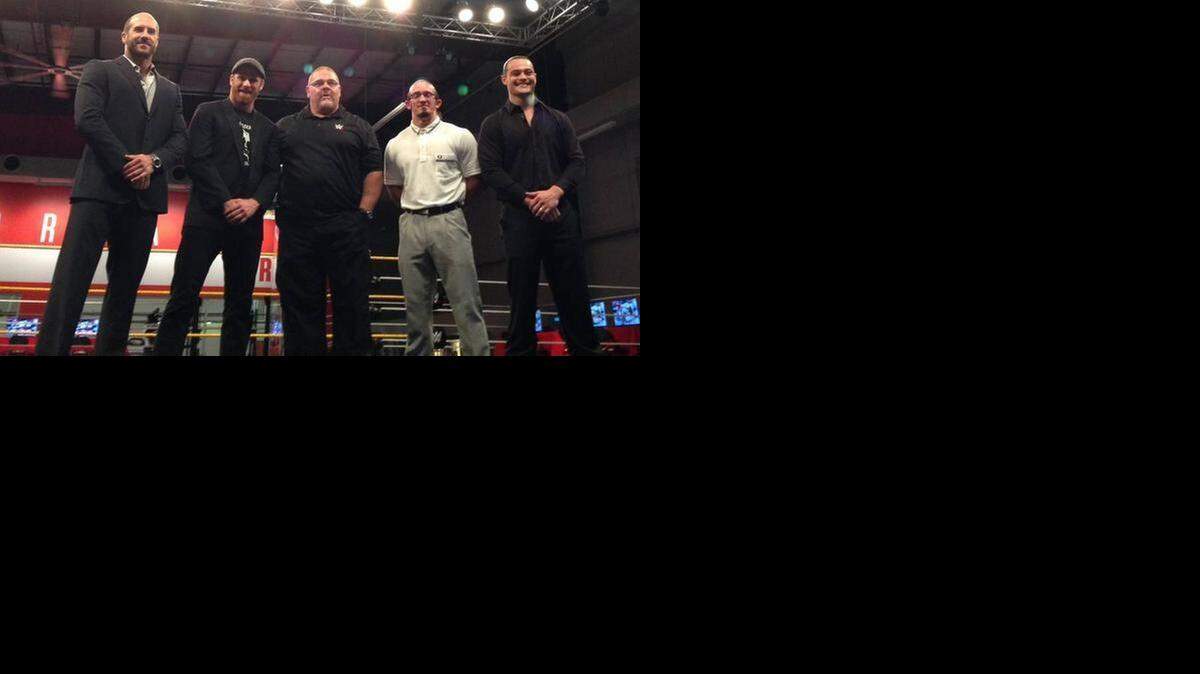 
WWE NXT head coach/trainer Bill DeMott (center) proudly stands with talented wrestlers/sports entertainers Cesaro, Sami Zayn, Adrian Neville and Bo Dallas at the WWE Performance Center in Orlando. DeMott took to Twitter to announce his resignation from WWE.
