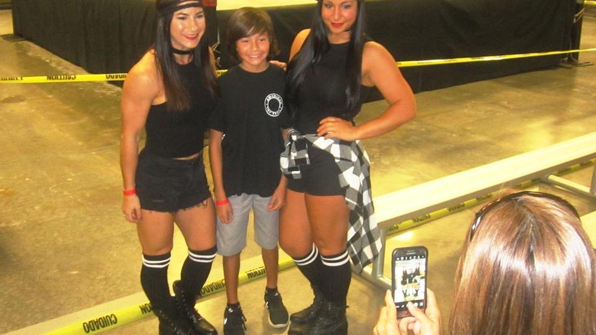 American Top Team MMA fighters Tecia The Tiny Tornado Torres (left) and Chelsea Brooks got into the Halloween spirit by dressing as WWE superstars The Bella Twins (Brie and Nikki) during American Top Team’s annual Halloween Party on Friday, Oct. 28, 2016 at its new facility in (South Florida) Coconut Creek.