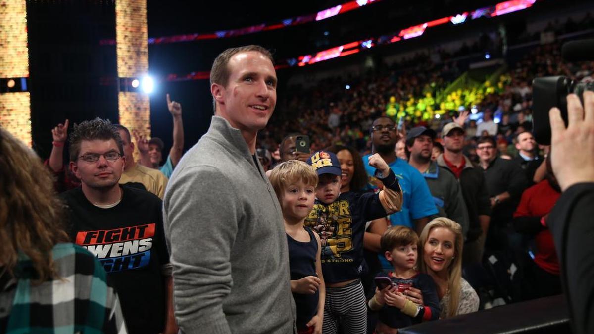 New Orleans Saints star quarterback Drew Brees sat ringside with his family for WWE Monday Night Raw on Jan. 11 at the Smoothie King Center in New Orleans.