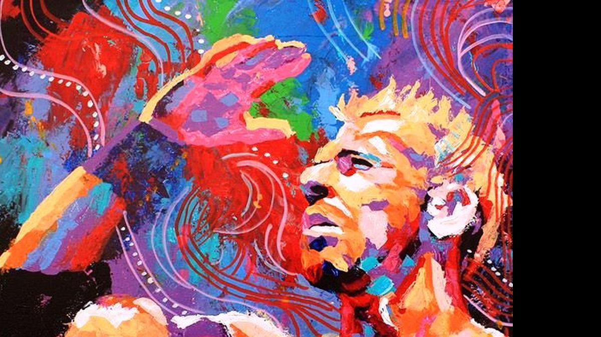 
Artist Rob Schamberger captures Christian on another canvas.
