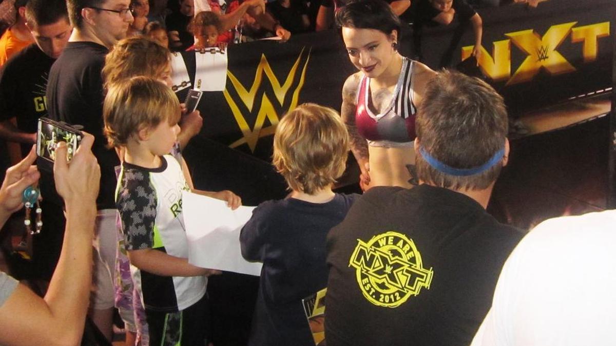 NXT Superstar Ruby Riot signs autographs and poses for photos with fans during a meet-n-greet before the WWE NXT show in February at the Havert L. Fenn Center in Fort Pierce. NXT returns to the Havert L. Fenn Center on Friday, April 7.