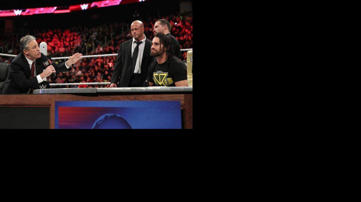 
The Daily Show’s Jon Stewart confronts The Daily Show’s Seth Rollins on WWE Monday Night Raw on March 2 from the Prudential Center in Newark, N.J., Stewart’s home state. Rollins and Stewart have been involved in a month-long social media and television war of words, leading to the face-to-face confrontation on Raw on the USA Network. Stewart is hosting “Night of Too Many Stars,” a benefit for autism schools, programs and services, at 8 p.m. EST Sunday, March 8 on Comedy Central. Also pictured is J&J Security (Joey Mercury and Jamie Noble).
