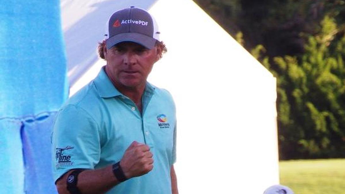 Scott McCarron gives a fist pump after making the winning putt for the Allianz.