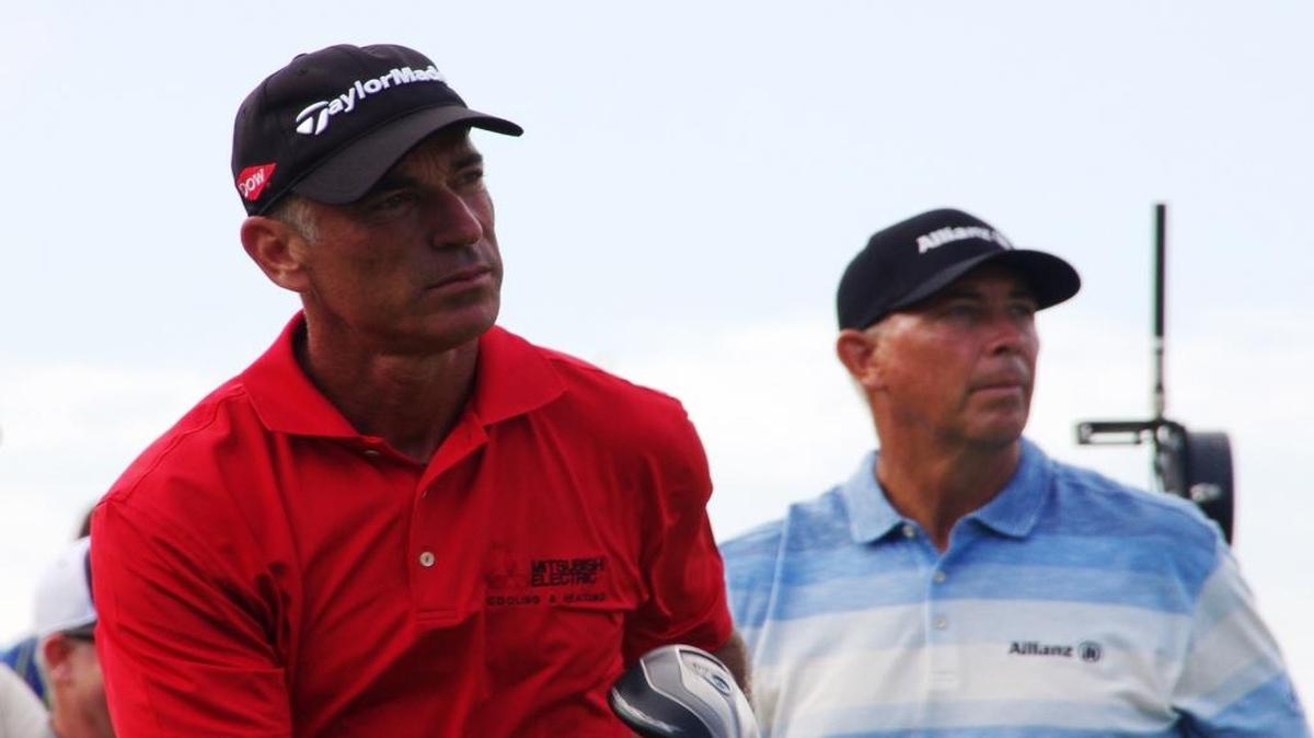 Corey Pavin follows his shot, as does Tom Lehman in the background at the Allianz Championship on Sat., Feb. 6, 2016.