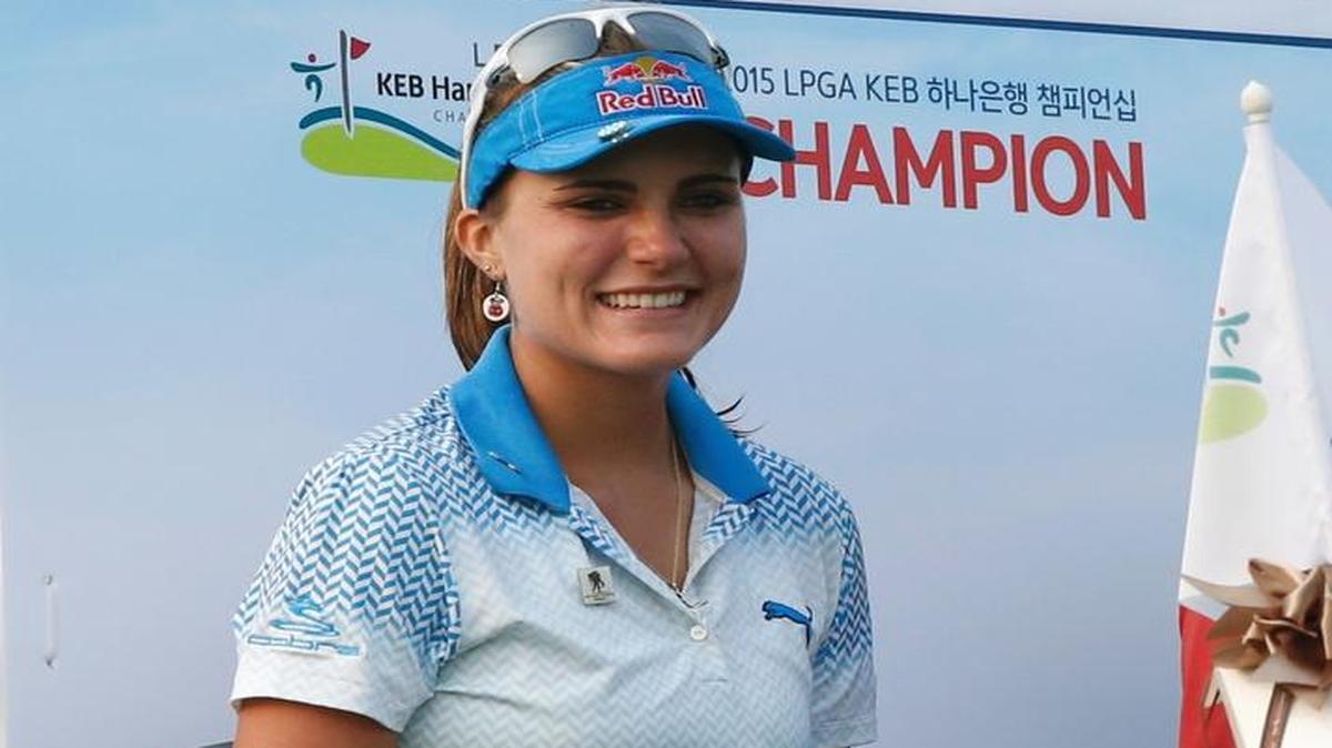 Lexi Thompson of the United States arrives for the winner's event for the LPGA KEB Hana Bank Championship golf tournament at Sky72 Golf Club in Incheon, South Korea, Sunday, Oct. 18, 2015.