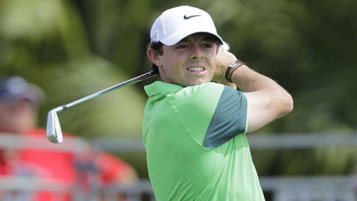 
Roy Mcllroy hits from the first tee during the first round of the Honda Classic golf tournament, Thursday, Feb. 26, 2015 in Palm Beach Gardens, Fla.. 
