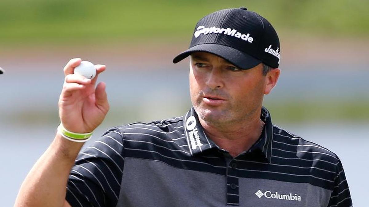 Ryan Palmer acknowledges the crowd as he finishes the second round of the Honda Classic golf tournament, Friday, Feb. 24, 2017, in Palm Beach Gardens, Fla.
