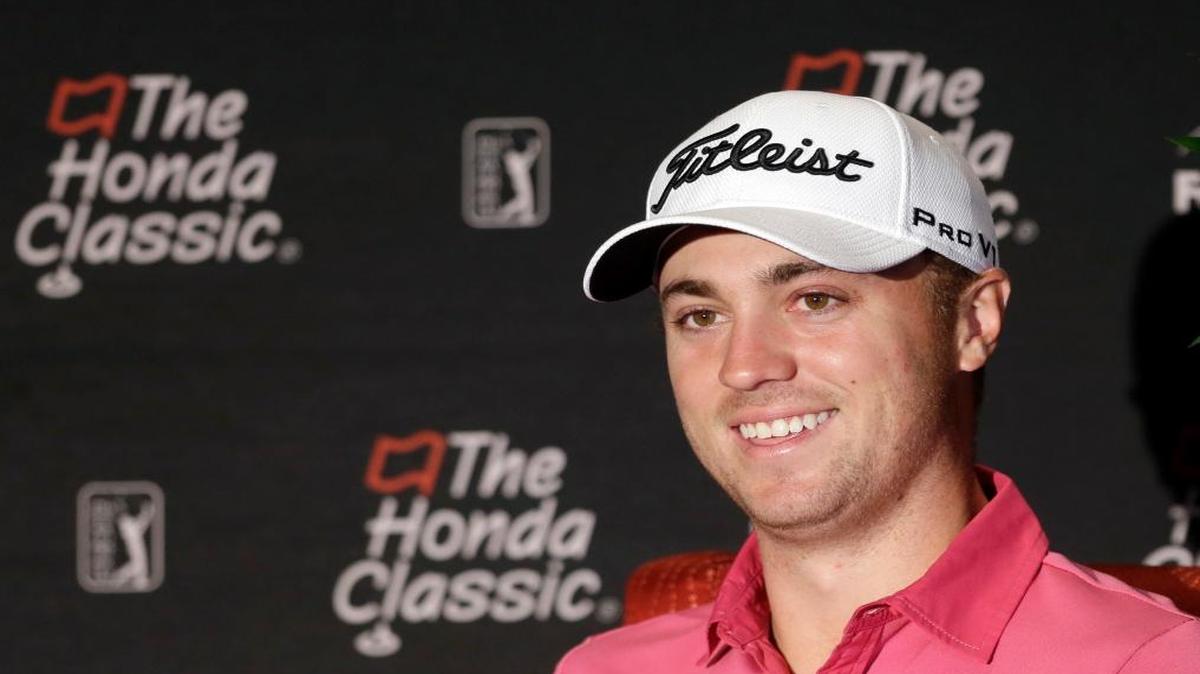 Justin Thomas smiles as he talks to reporters at the Honda Classic golf tournament practice, Wed., Feb. 22, 2017, in Palm Beach Gardens, Fla.