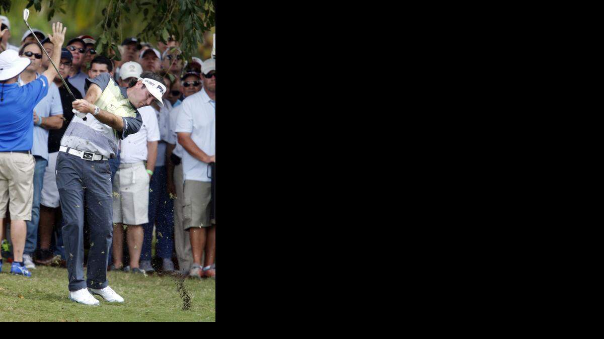 
Bubba Watson hits near the crowd on the first fairway in the third round of the World Golf Classic-Cadillac Championships at Trump National Doral in Doral on March 7, 2015.
