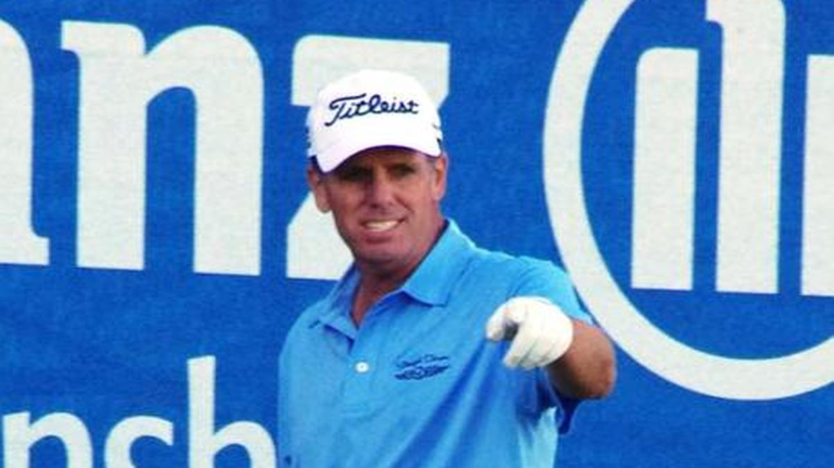 Doug Garwood, above, shot an 8-under 64 to join Olin Browne, Scott McCarron and Joe Durant at 12-under.