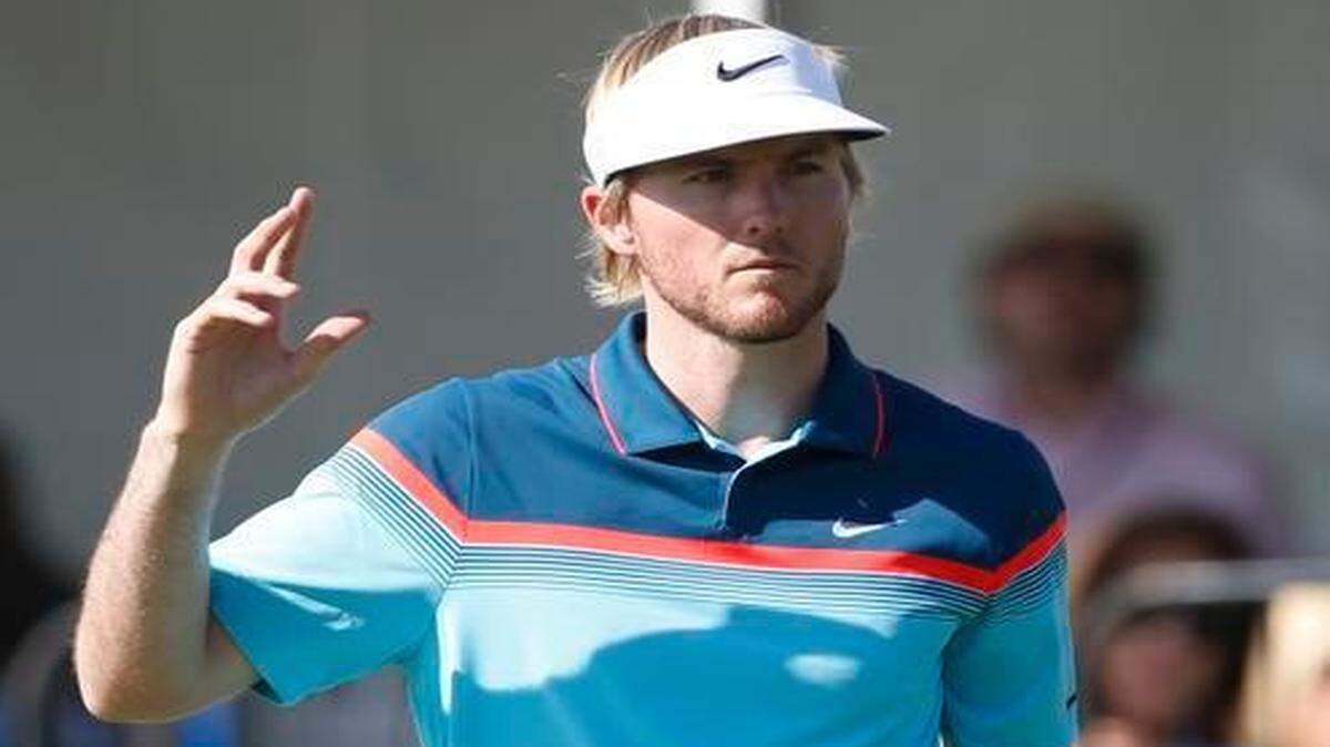 
Russell Henley acknowledges the fans after making a birdie putt on the fourth hole during the final round of the Phoenix Open golf tournament, Sunday, Feb. 1, 2015, in Scottsdale, Arizona.
