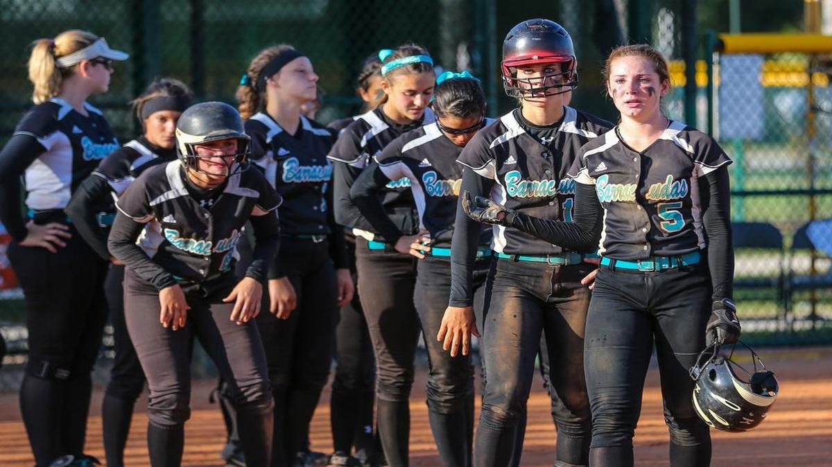 
Coral Reef shows their disappointment after losing 5-1 against Lithia-Newsome in the Class 8A state championship at Historic Dodgertown in Vero Beach, FL, on Saturday, May 9.
