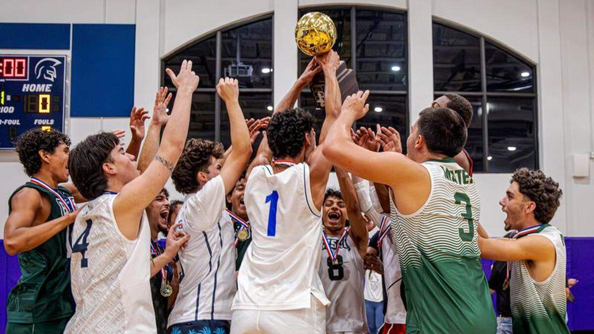 The North celebrates a dramatic comeback win over the South at the annual Miami-Dade High School Boys’ Volleyball All-Star Game at True North.