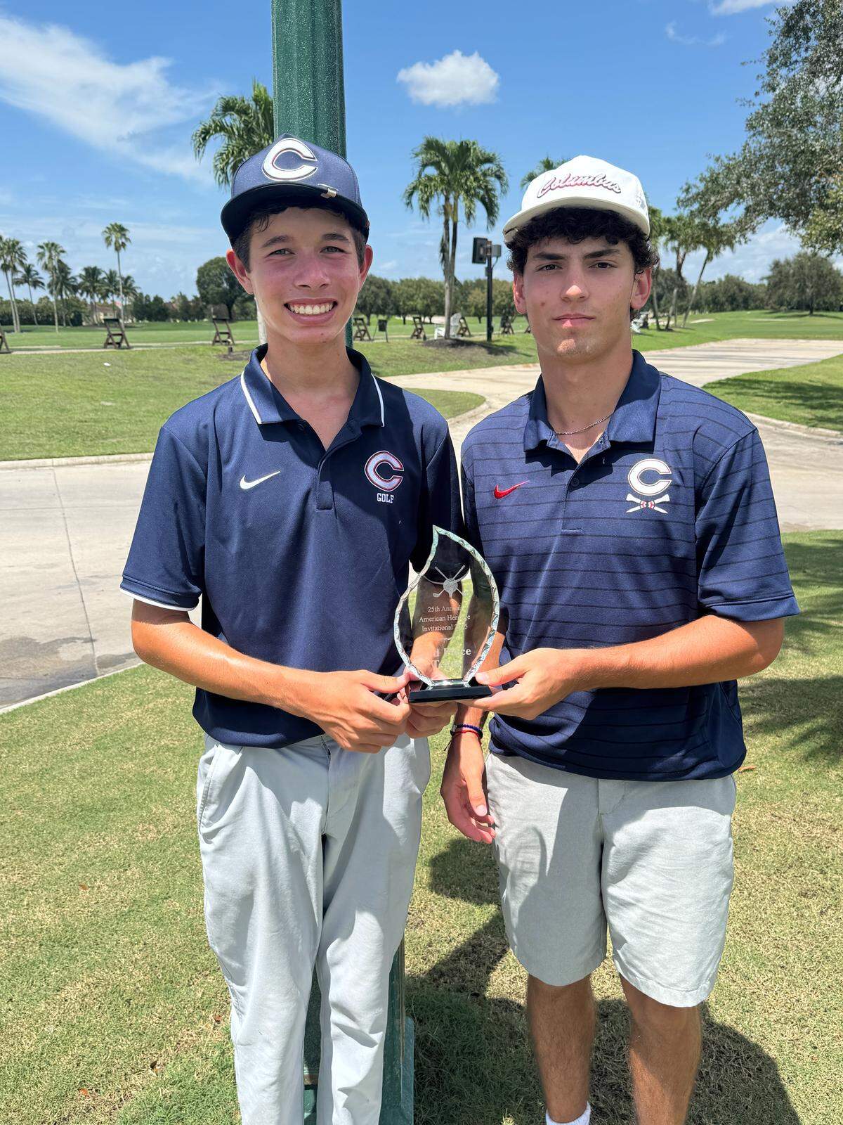 Columbus teammates Sebastian Eterovic (left) and Joe Fernandez tied for third at 73 at the 27th annual American Heritage High School Boys’ Golf Tournament at Lago Mar Country Club in Plantation.