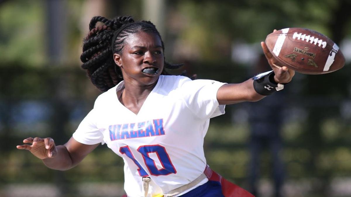 Hialeah’s Ja’Keira Betties makes a pitch during Friday’s Class 2A state flag football semifinal. Hialeah lost the game 40-12 to Seminole Ridge.