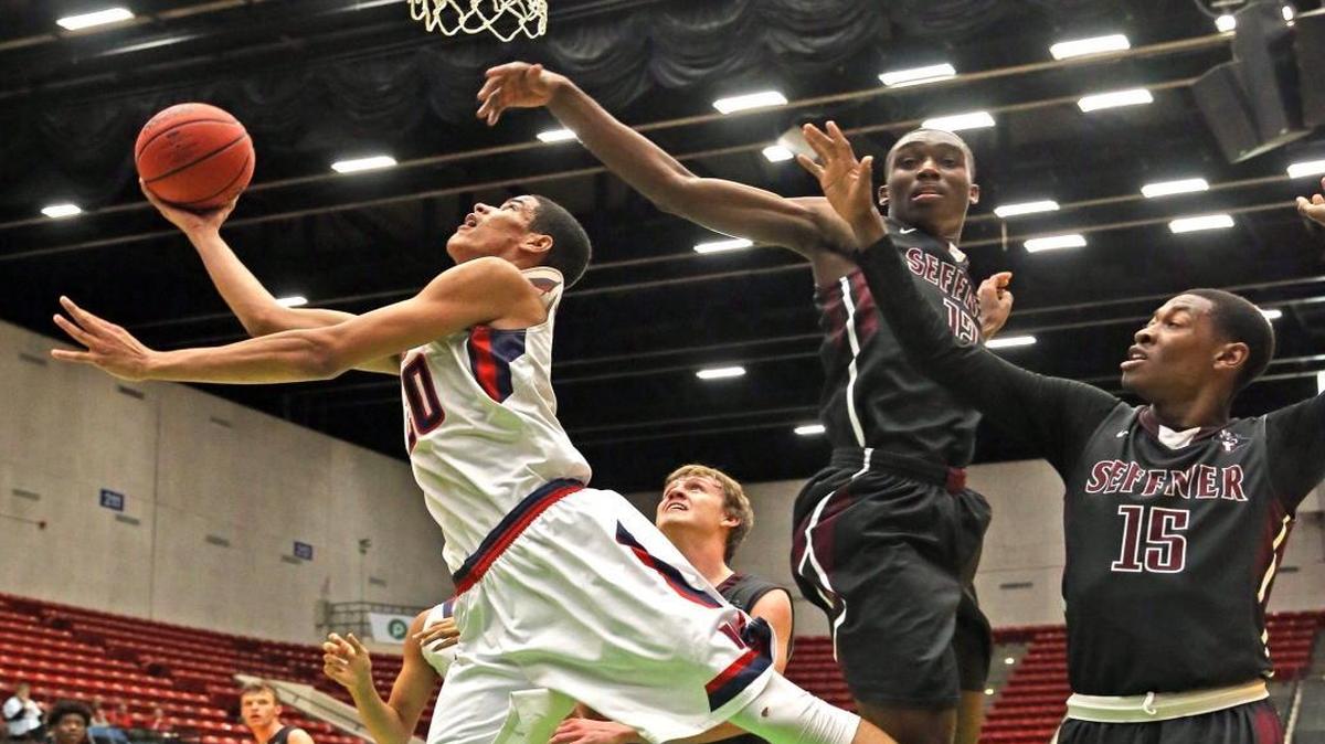 Westminster Academy Paul Atkinson scores in the final seconds of the first half as they play Seffer Christian in the FHSSC Boys 4A Semifinals in Lakeland, Florida, March 1, 2017.