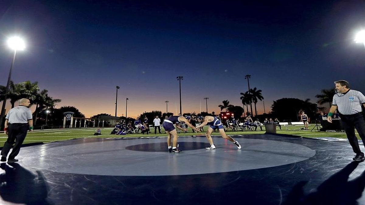 Columbus and Southwest compete in a wrestling match outdoors believed to be the first of its kind on Tues., Jan. 24, 2017. The match was conducted outdoors on the football field at Columbus High School.
