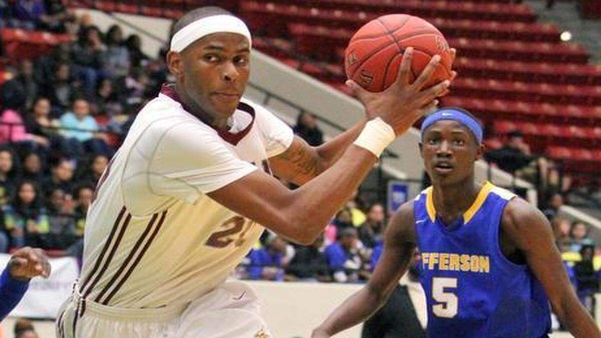 
Norland’s Dewan Huell drives to the basket as Tampa Jefferson defenders close in during a Class 6A boys’ basketball semifinal Friday, Feb. 27, 2015 in Lakeland, Fla. Norland won 67-43 and will play for the state title Saturday against Gainesville.
