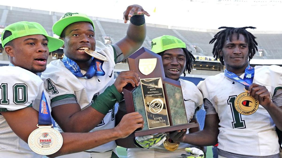 
From left, Miami Central’s Olin Cushion III, Fermin Silva, Anthony Jones, 
and Da’Vante Phillips celebrate after beating Seffner Armwood to win last season’s Class 6A title.
