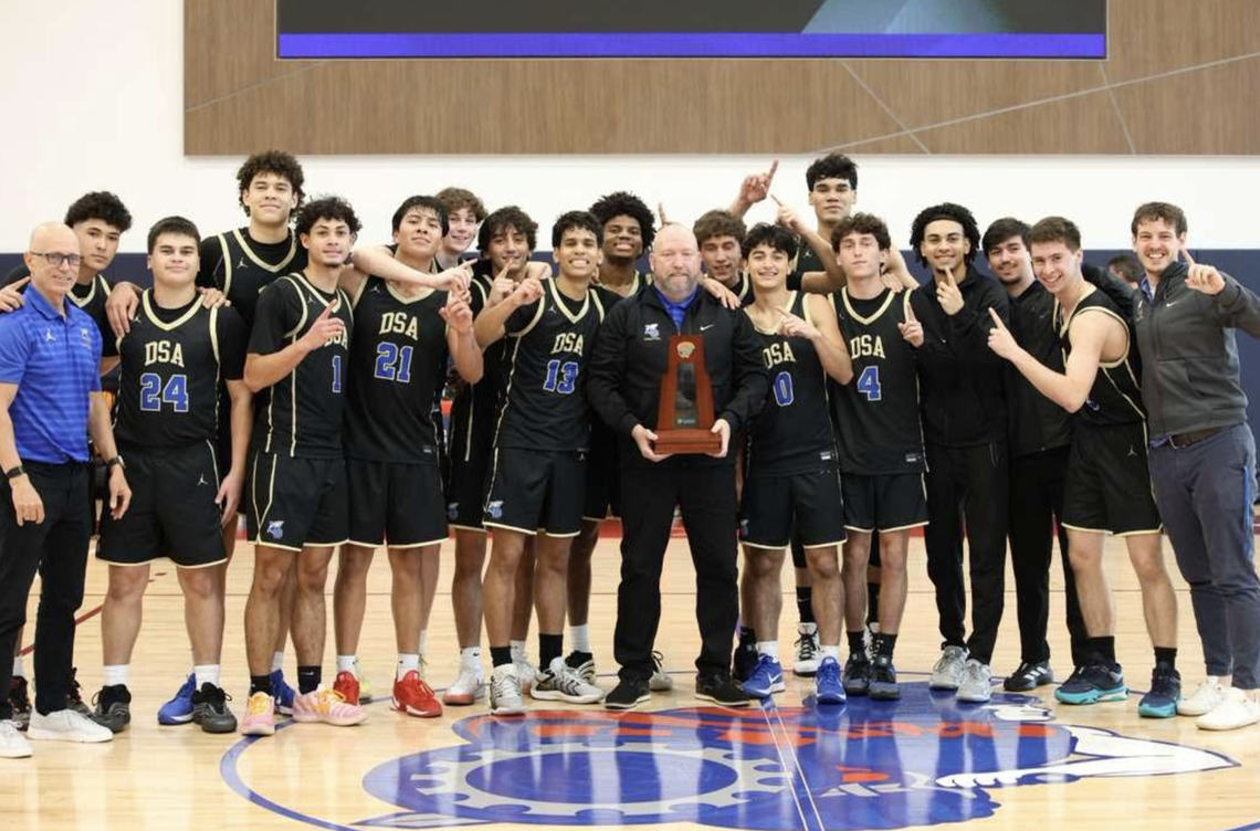 The district champion Divine Savior boys’ basketball team.