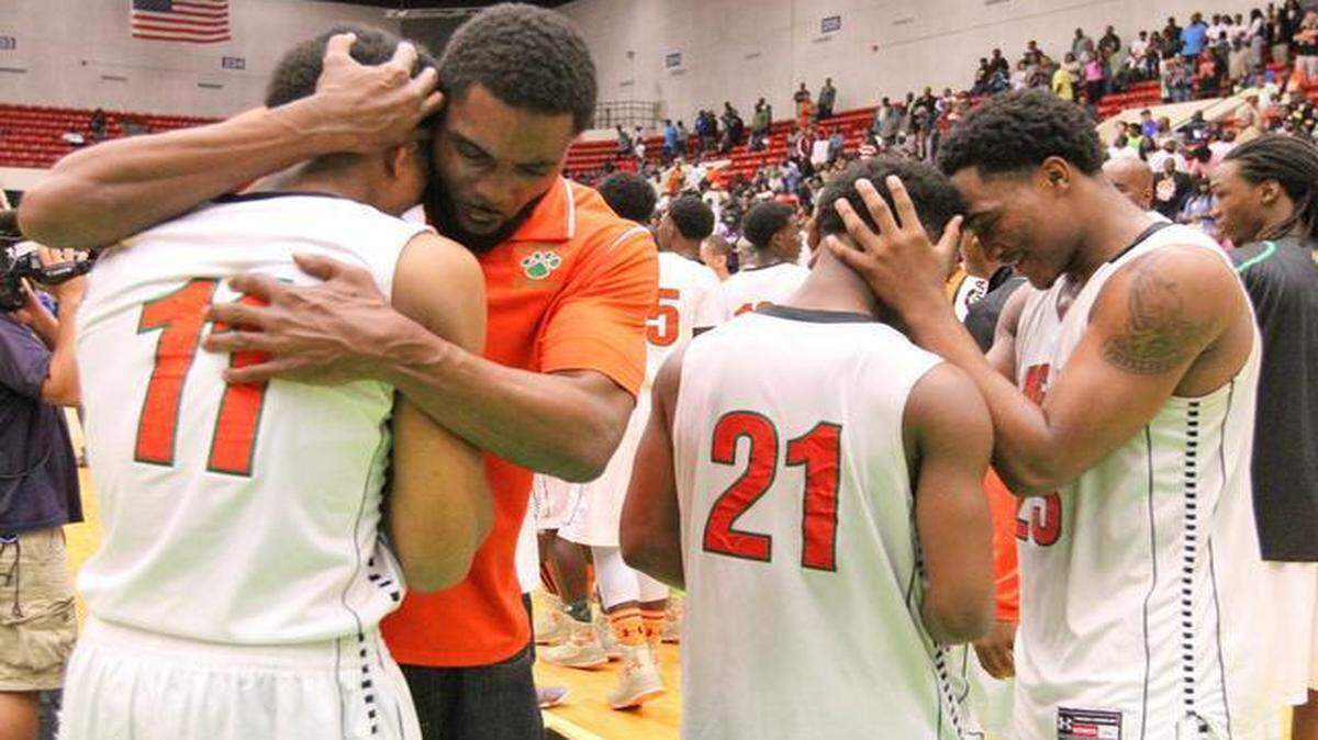 
Blanche Ely players celebrate after winning the Class 7A basketball state title Saturday, Feb. 28, 2015 in Lakeland, Fla. 
