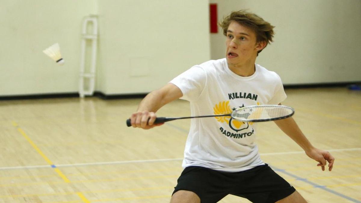 Christopher Hallstrand of Miami Killian Senior High School returns a shot against Brian Bangoy of Ronald W. Reagan / Doral Senior High School during their match at GMAC Badminton Championship tournament on Wednesday, April 5, 2017 at Braddock High School in Miami.