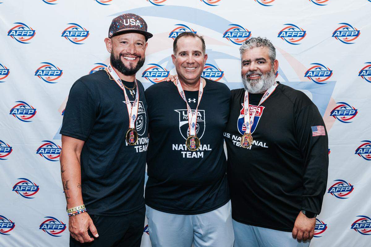 U.S. flag football coaches (from left) Willy Perez, Jorge Cascudo and Rudy Fernandez are from Miami.