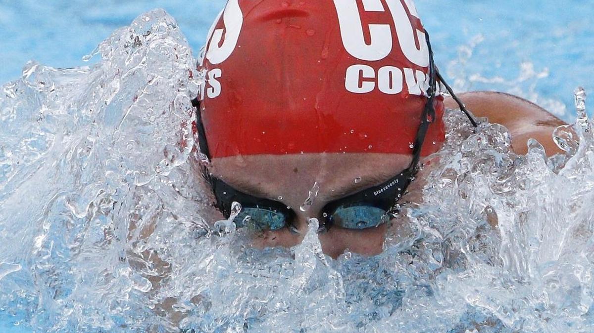 In this Oct. 7, 2017, file photo, Cooper City Kathleen Golding competes in the women 200 yard individual medley during the 2017 BCAA Swimming and Diving championships at Plantation Central Park.