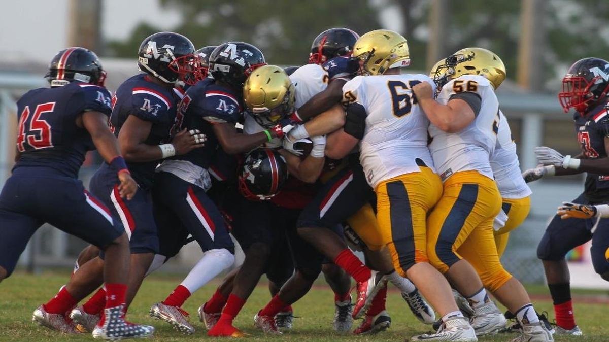 Miramar High football coach Pierre Senatus resigned Thursday. Here are the Patriots playing against St. Thomas Aquinas on Friday, Sept. 2, in Miramar, Fla.