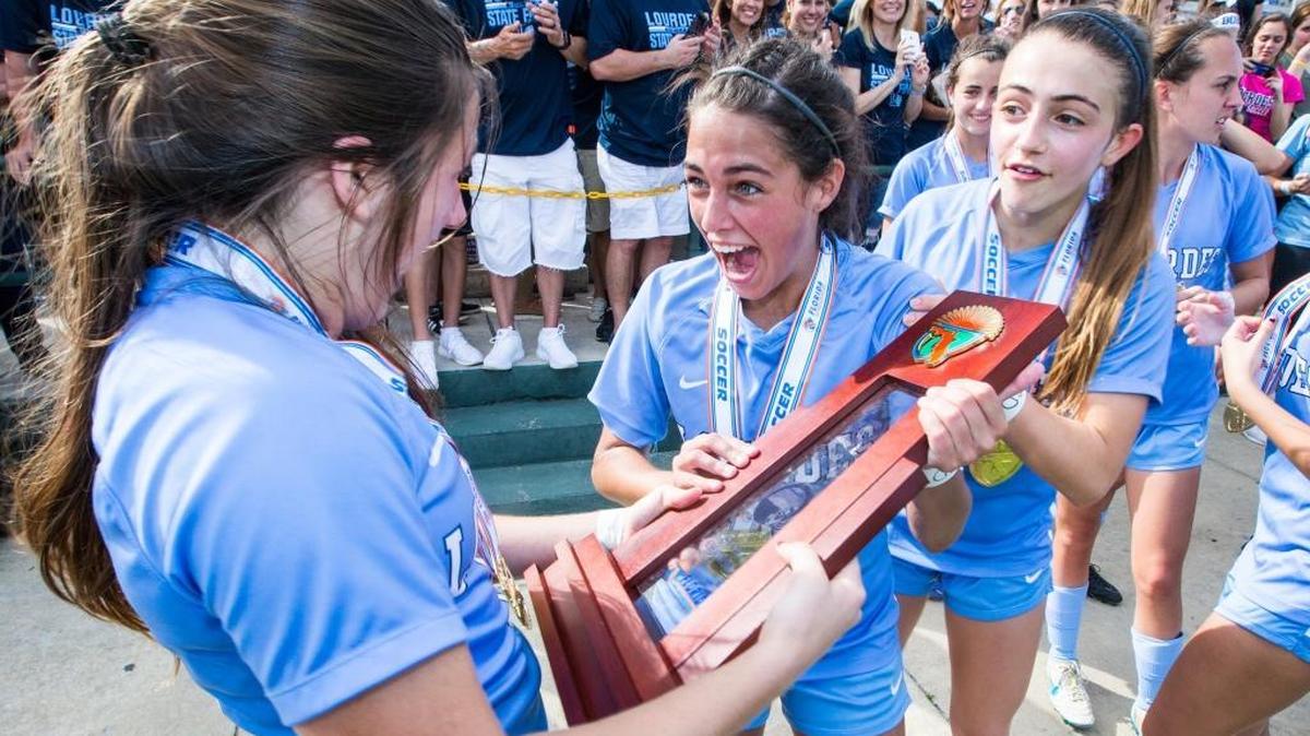 Our Lady of Lourdes High School celebrates after winning the State Championship.