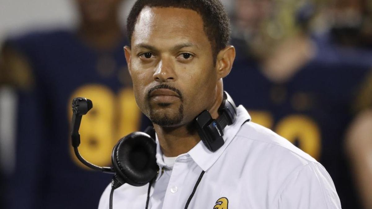 Aquinas head coach Roger Harriott on the sidelines as St. Thomas Aquinas plays Tampa Plant for a state football title at Camping World Stadium in Orlando on Friday, December 9, 2016.
