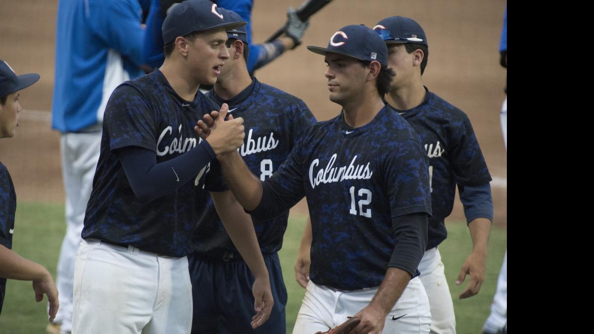 
Columbus pitcher Chris Coipel is congratulated in the first inning of a Class 8A semifinal against Lake Worth Park Vista at JetBlue Park in Fort Myers on Wednesday, May 20, 2015. 
