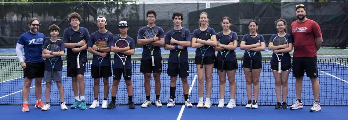 The AIE boys’ and girls’ tennis teams.